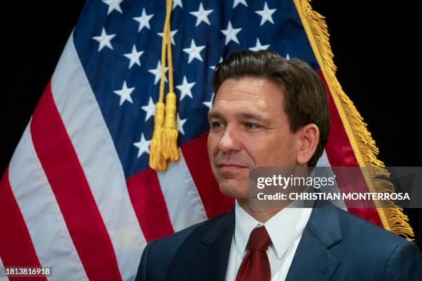 Florida Governor and Republican presidential hopeful Ron DeSantis speaks in the spin room following a debate held by Fox News, in Alpharetta,...