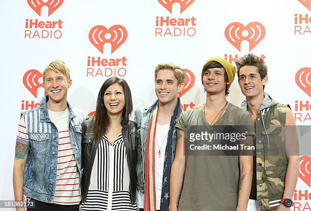 Brian Dales, Stephen Gomez, Josh Montgomery, Jess Bowen and John Gomez of The Summer Set arrive at the iHeartRadio Music Festival - press room held...