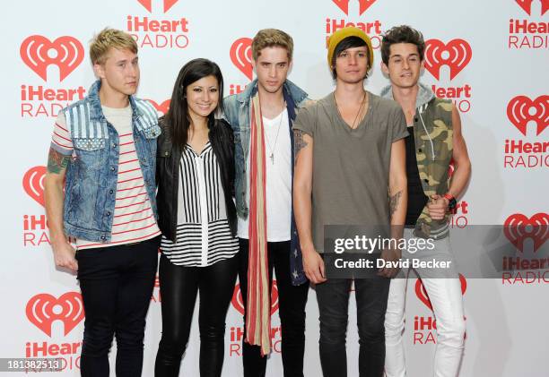 Musicians Brian Dales, Jess Bowen, Stephen Gomez, Josh Montgomery and John Gomez of The Summer Set attend the iHeartRadio Music Festival at the MGM...