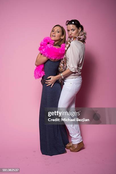 Actresses Carly Craig and Caroline Morahan pose for a portrait at the Mark Kearney Group - "Iced Out" Luxury Emmy Suite on September 20, 2013 in Los...