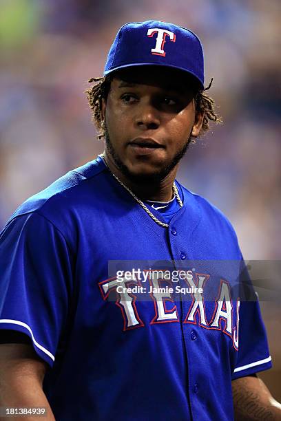 Reflief pitcher Neftali Feliz of the Texas Rangers is pulled from the game after walking in the winning run during the 8th inning of the game at...