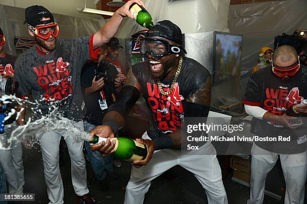 David Ortiz of the Boston Red Sox celebrates after defeating the Toronto Blue Jays and clinching the American League East on September 20, 2013 at...