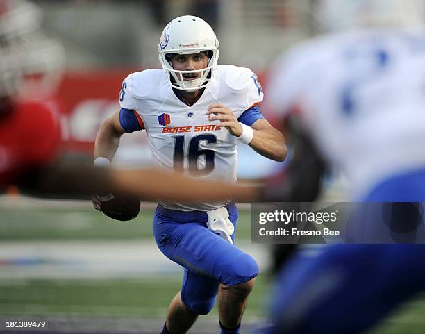 Boise State quarterback Joe Southwick scrambles against Fresno State at Bulldog Stadium in Fresno, California, on Friday, September 20, 2013.