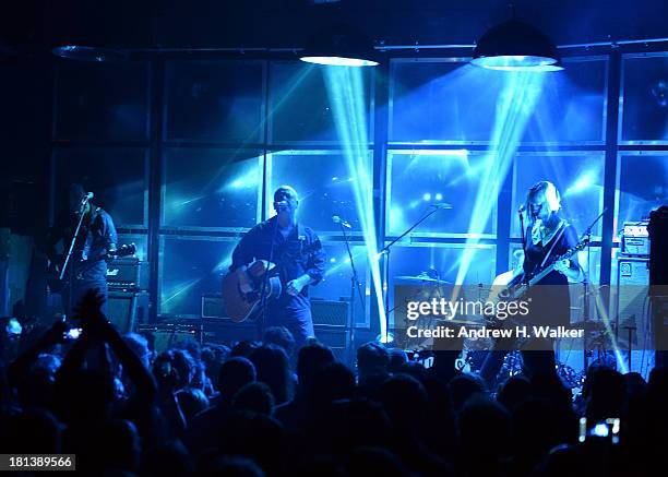 Joey Santiago, Black Francis, David Lovering and Kim Shattuck of the Pixies perform at The Bowery Ballroom on September 20, 2013 in New York City.