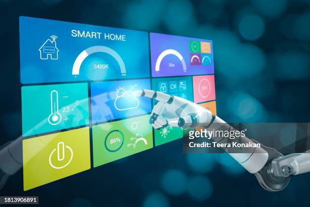 white cyborg hand is touching on controlling home electronics on the app smart living lifestyle. - convenience icon stock pictures, royalty-free photos & images
