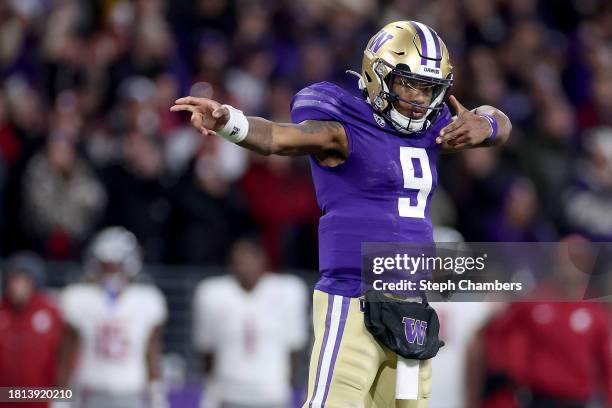 Michael Penix Jr. #9 of the Washington Huskies reacts after a first down against the Washington State Cougars during the fourth quarter at Husky...