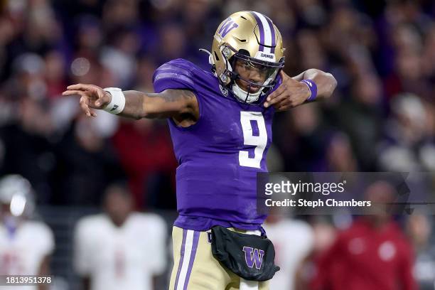 Michael Penix Jr. #9 of the Washington Huskies reacts after a first down against the Washington State Cougars during the fourth quarter at Husky...