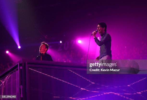 Benny Benassi and Gary Go perform onstage during the iHeartRadio Music Festival at the MGM Grand Garden Arena on September 20, 2013 in Las Vegas,...