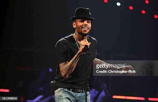 Singer Chris Brown performs onstage during the iHeartRadio Music Festival at the MGM Grand Garden Arena on September 20, 2013 in Las Vegas, Nevada.