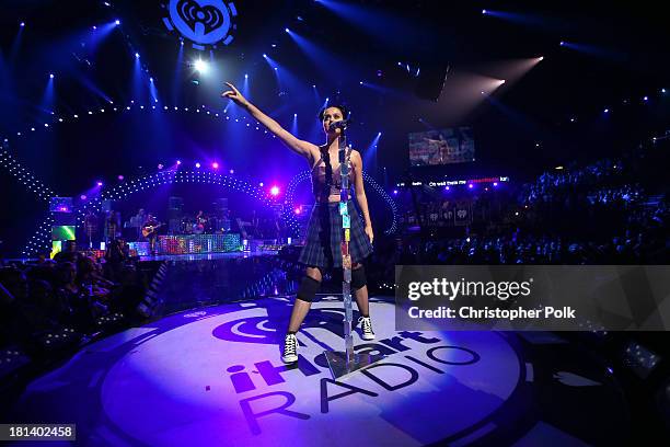 Entertainer Katy Perry performs onstage during the iHeartRadio Music Festival at the MGM Grand Garden Arena on September 20, 2013 in Las Vegas,...