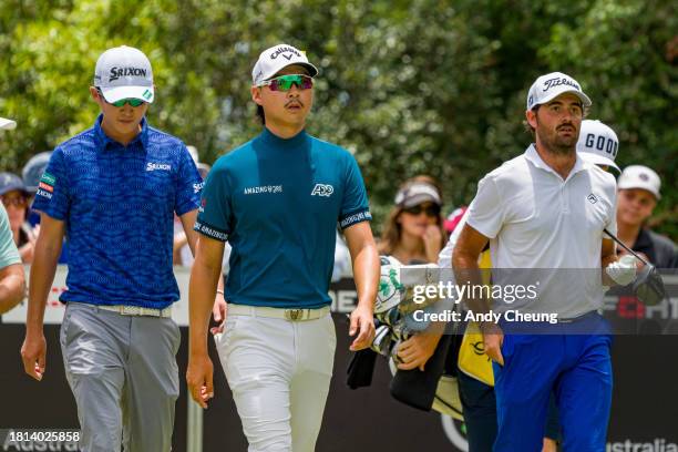 Curtis Luck of Australia, Min Woo Lee of Australia and Rikuya Hoshino of Japan walk down the 3rd fairway during day four of the 2023 Australian PGA...