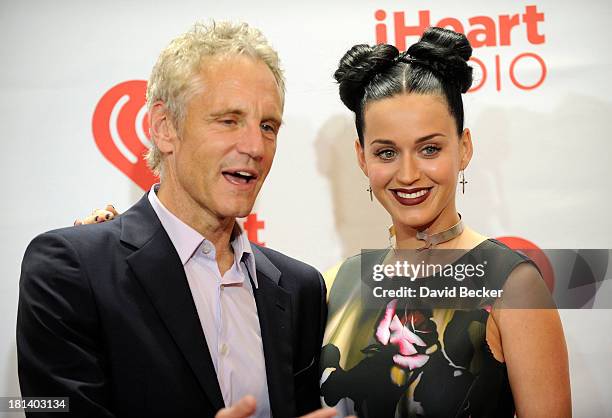 Clear Channel President of Entertainment Enterprises John Sykes and Katy Perry attend the iHeartRadio Music Festival at the MGM Grand Garden Arena on...