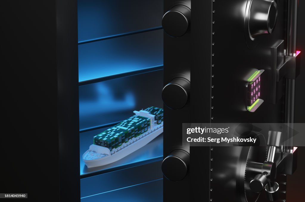 Close-up of a cargo ship with containers inside a metal safe.