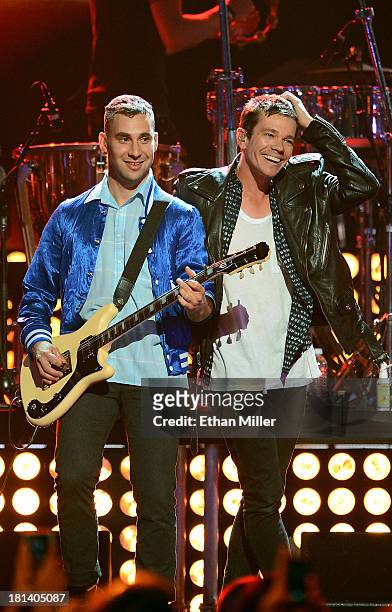 Jack Antonoff and Nate Ruess of Fun. Perform onstage with Queen during the iHeartRadio Music Festival at the MGM Grand Garden Arena on September 20,...