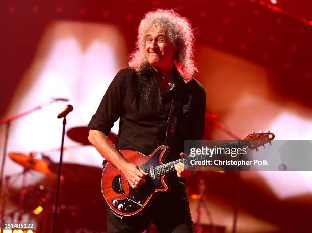 Brian May of Queen performs onstage during the iHeartRadio Music Festival at the MGM Grand Garden Arena on September 20, 2013 in Las Vegas, Nevada.