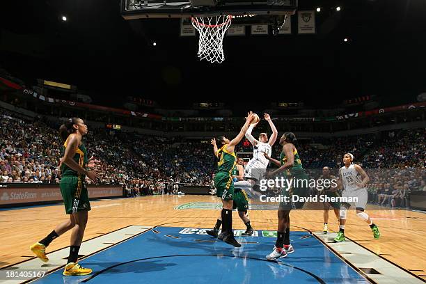Lindsay Whalen of the Minnesota Lynx shoots the basketball against Tanisha Wright of the Seattle Storm during the WNBA Western Conference Semifinals...