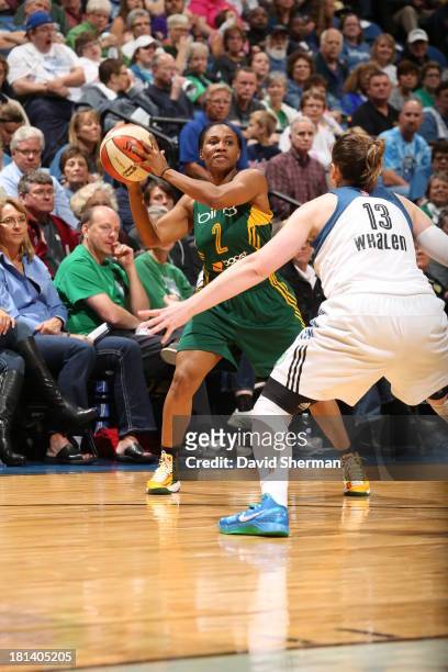 Temeka Johnson of the Seattle Storm looks to pass against Lindsay Whalen of the Minnesota Lynx during the WNBA Western Conference Semifinals Game 1...