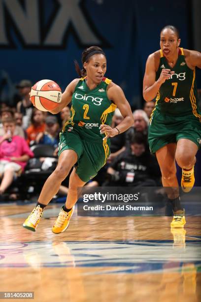 Temeka Johnson of the Seattle Storm brings the basketball up the court against the Minnesota Lynx during the WNBA Western Conference Semifinals Game...