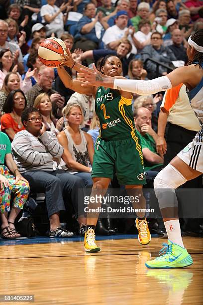 Temeka Johnson of the Seattle Storm looks to pass against Seimone Augustus of the Minnesota Lynx during the WNBA Western Conference Semifinals Game 1...