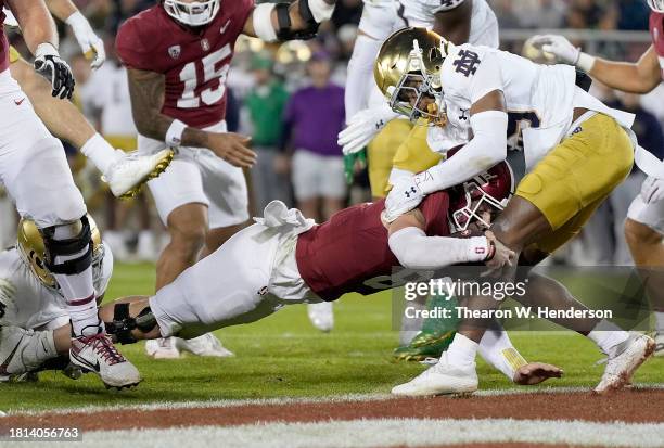 Justin Lamson of the Stanford Cardinal scores on a four yard touchdown run against the Notre Dame Fighting Irish during the fourth quarter at...