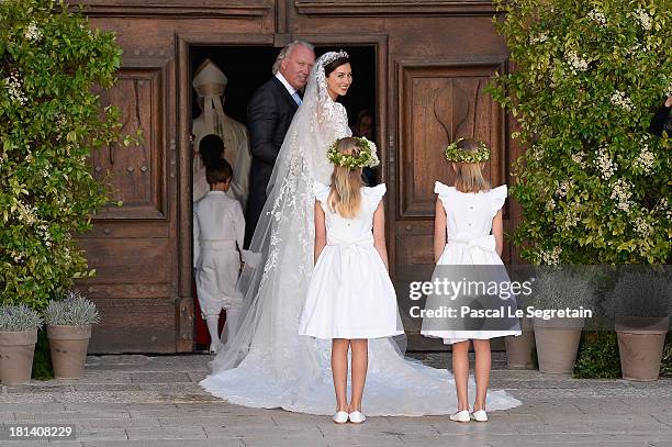 Princess Claire Of Luxembourg, her father Hartmut Lademacher arrive to the Religious Wedding Of Prince Felix Of Luxembourg & Claire Lademacher at the...