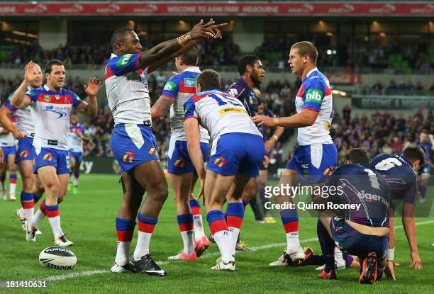 Akuila Uate of the Knights celebrates a try during the NRL Second Semi Final match between the Melbourne Storm and the Newcastle Knights at AAMI Park...