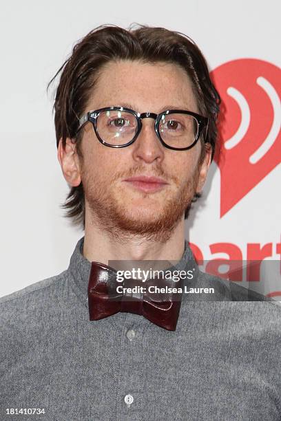 Singer Gary Go poses in the iHeartRadio music festival photo room on September 20, 2013 in Las Vegas, Nevada.