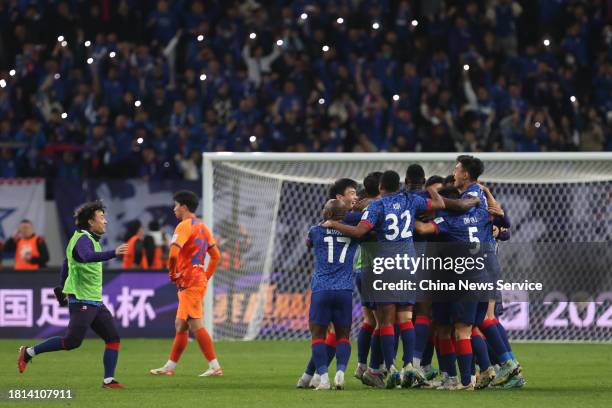 Players of Shanghai Shenhua celebrate after winning the 2023 Chinese Football Association Cup final match between Shanghai Shenhua and Shandong...