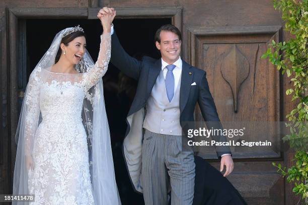 Princess Claire Of Luxembourg and Prince Felix Of Luxembourg depart their wedding ceremony at the Basilique Sainte Marie-Madeleine on September 21,...