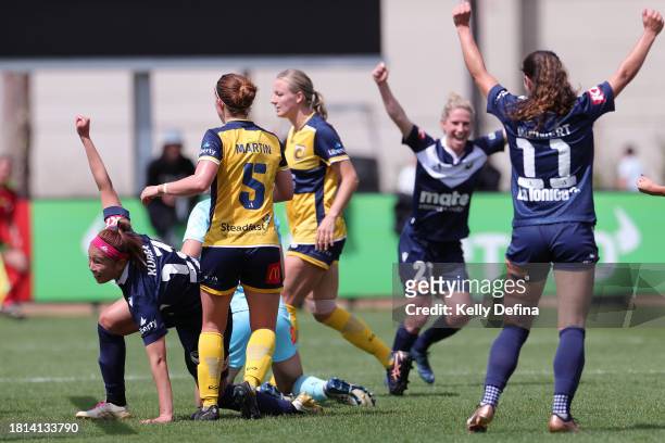 Kurea Okino of Victory celebrates scoring a goal with team mates during the A-League Women round six match between Melbourne Victory and Central...