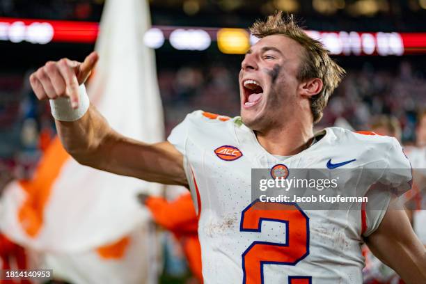 Cade Klubnik of the Clemson Tigers celebrates after defeating the South Carolina Gamecocks during their game at Williams-Brice Stadium on November...