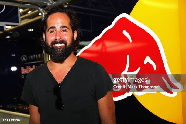 Drummer Ronnie Vannucci Jr of the band The Killers visits the Infiniti Red Bull racing garage during qualifying for the Singapore Formula One Grand...