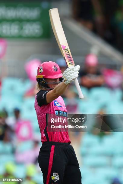Ellyse Perry of the Sixers celebrates after scoring a half century during the WBBL match between Sydney Sixers and Sydney Thunder at Sydney Cricket...