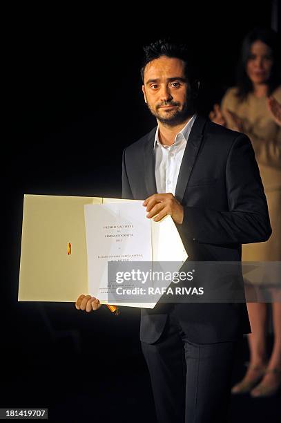 Spanish director Juan Antonio Bayona poses after receiving the National Prize of Cinematography during the 61st San Sebastian International Film...