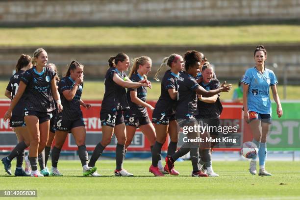 Julia Grosso of Melbourne City celebrates with team mates after scoring a goal during the A-League Women round six match between Sydney FC and...