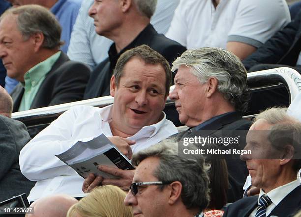 Newcastle United owner Mike Ashley and Newcastle United Director of Football Joe Kinnear look on during the Barclays Premier League match between...