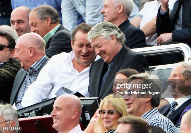 Newcastle United owner Mike Ashley and Newcastle United Director of Football Joe Kinnear look on during the Barclays Premier League match between...