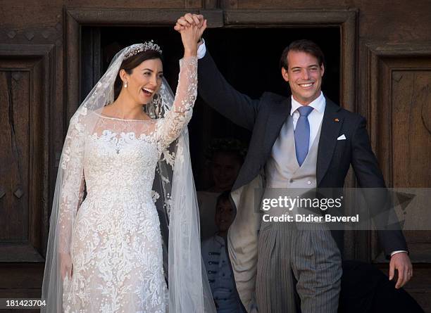 Princess Claire of Luxembourg and Prince Felix of Luxembourg depart their wedding ceremony at Basilique Sainte Marie-Madeleine on September 21, 2013...