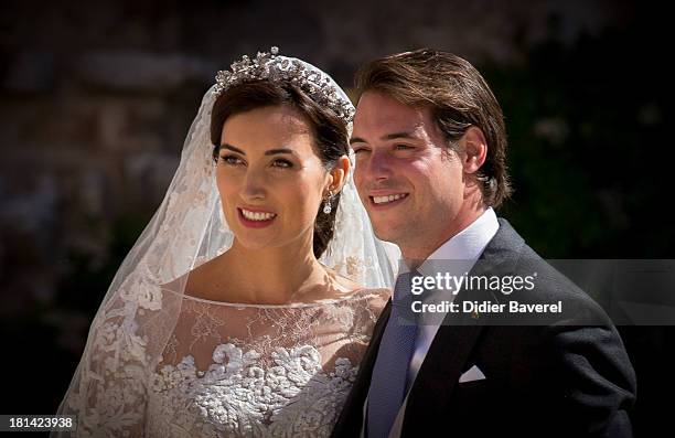 Princess Claire of Luxembourg and Prince Felix of Luxembourg depart their wedding ceremony at Basilique Sainte Marie-Madeleine on September 21, 2013...