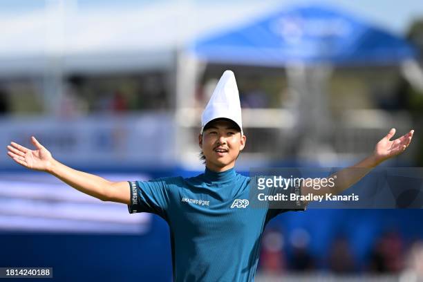 Min Woo Lee of Australia interacts with the crowd on the 17th hole whilst wearing a chefs hat during day four of the 2023 Australian PGA Championship...