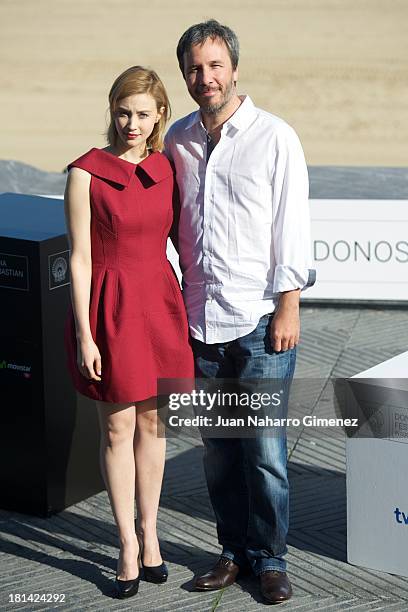 Canadian actress Sarah Gadon and Denis Villeneuve attend 'Enemy' photocall at Kursaal on September 21, 2013 in San Sebastian, Spain.