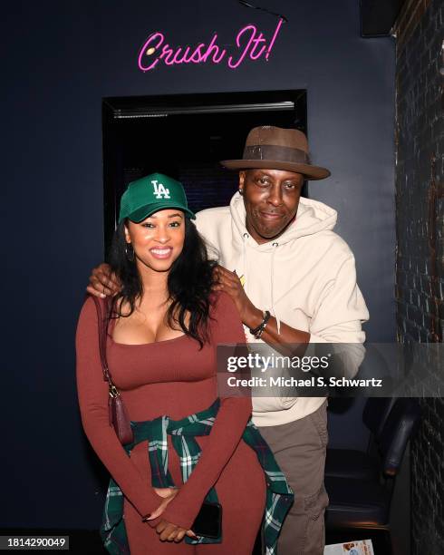 Comedians Lauren Harding and Arsenio Hall pose at The Ice House Comedy Club on November 25, 2023 in Pasadena, California.