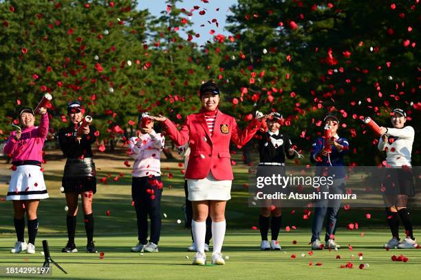 Miyuu Yamashita of Japan is congratulated by fellow players after the award ceremony following the final round of JLPGA Tour Championship Ricoh Cup...