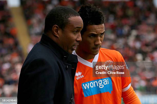 Paul Ince of Blackpool speaks with son Tom Ince prior to kick off in the Sky Bet Championship match between Blackpool and Leicester City at...