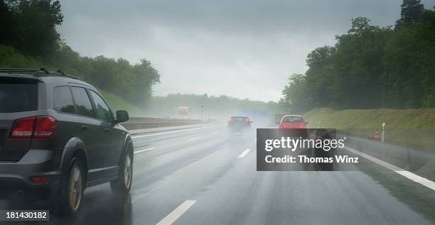 driving on freeway a81 in the rain - rain road stock pictures, royalty-free photos & images