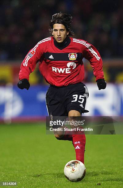 Diego Placente of Bayer 04 Leverkusen runs with the ball during the German Bundesliga match between Bayer 04 Leverkusen and FC Energie Cottbus held...