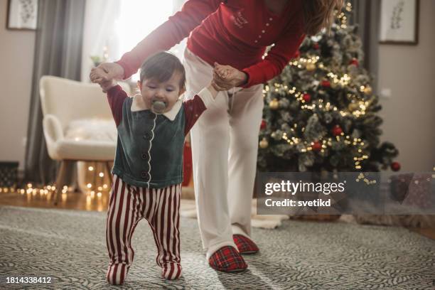 festive playtime - pyjamas stock pictures, royalty-free photos & images