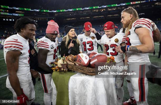 Broadcaster Melissa Stark interviews Charvarius Ward, Deebo Samuel, Brock Purdy, Christian McCaffrey and George Kittle of the San Francisco 49ers on...