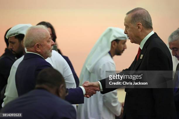 President of Brazil Luiz Inácio Lula da Silva greets President of Turkey Recep Tayyip Erdoan as they attend the opening ceremony of the World Climate...