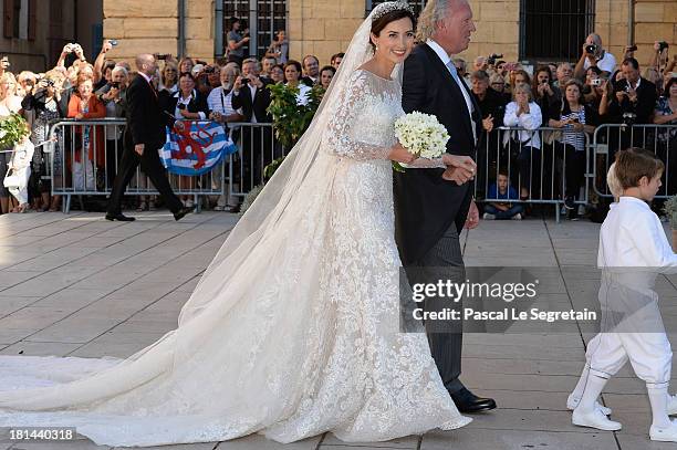 Princess Claire Of Luxembourg and her father Hartmut Lademacher arrive to the Religious Wedding Of Prince Felix Of Luxembourg and Claire Lademacher...